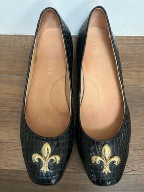 Diana E. Kelly black ballet Croc-Embossed Flats with Gold Fleur De Lis design